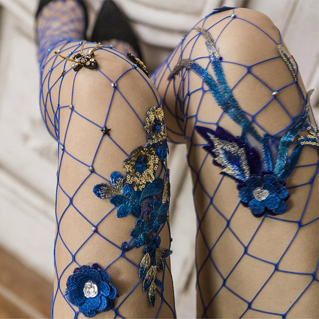 Carnival style glitter flower adorned luxury fishnet tights